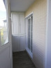 Обшивка балконной стены с откосами на балконный блок.